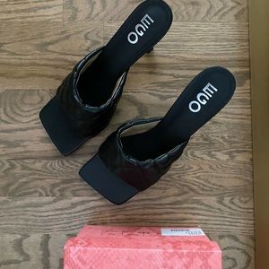 EGO official black quilted heel never worn